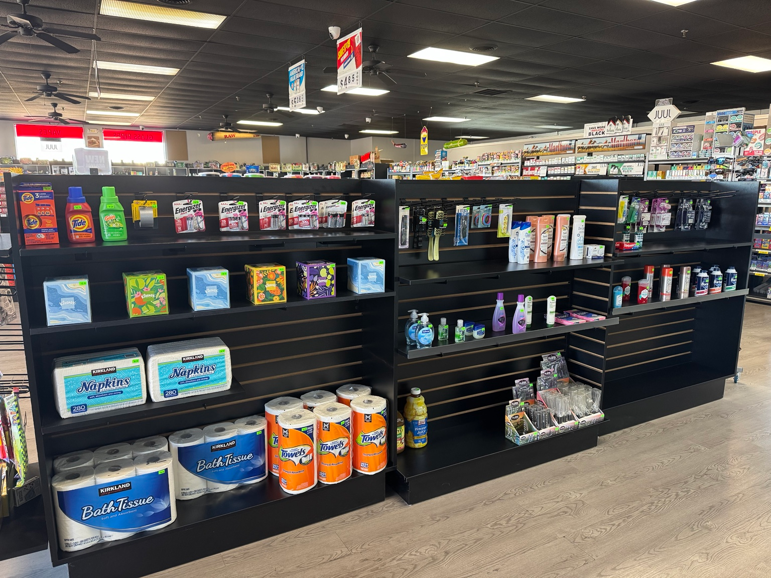 Personal-care and household products on shelves at Miamisburg Smoke Shop
